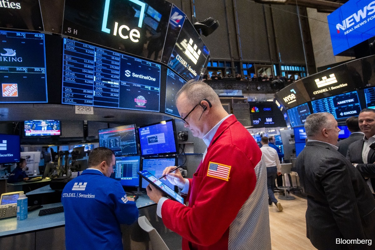 Wall St opens higher after Fed's Waller signals patience on rate policy