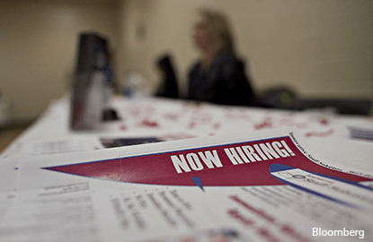 US jobless claims unexpectedly rise; labor market still strong