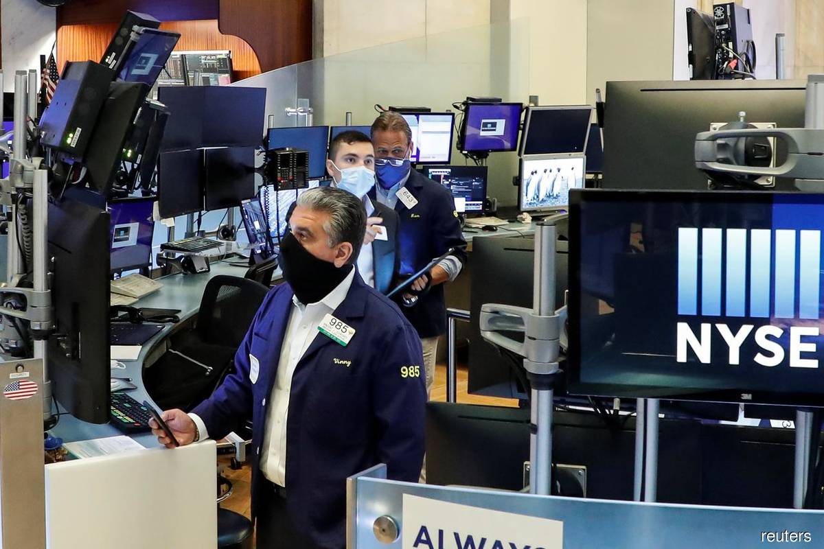 Dow sinks 2% as virus surge stifles recovery hopes