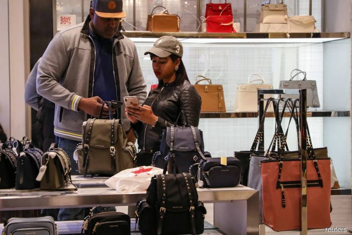 US producer prices rise moderately; Covid-19 seen taming inflation
