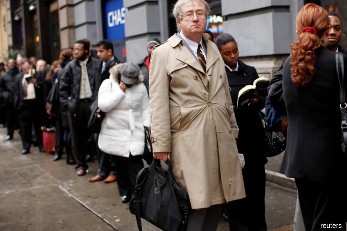 US jobless claims were little changed near a five-month high