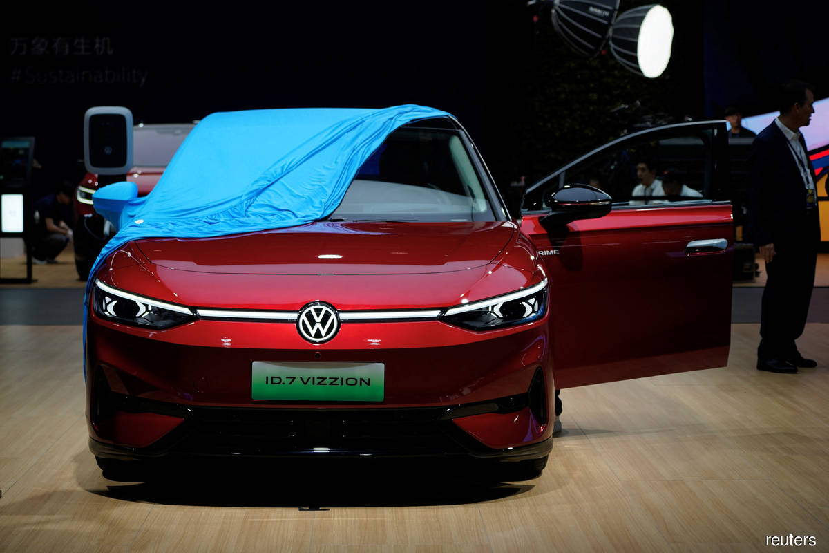 A Volkswagen ID.7 Vizzion is displayed at the Auto Shanghai show. Volkswagen is spending US$1.1 billion to build a new development, innovation and procurement centre in China.