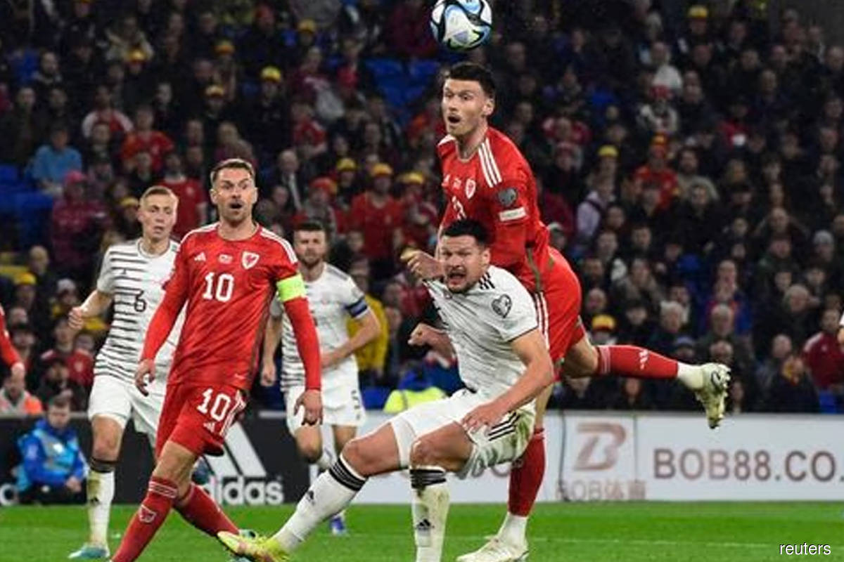 Moore lifts Wales to 1-0 Euro qualifying win over Latvia