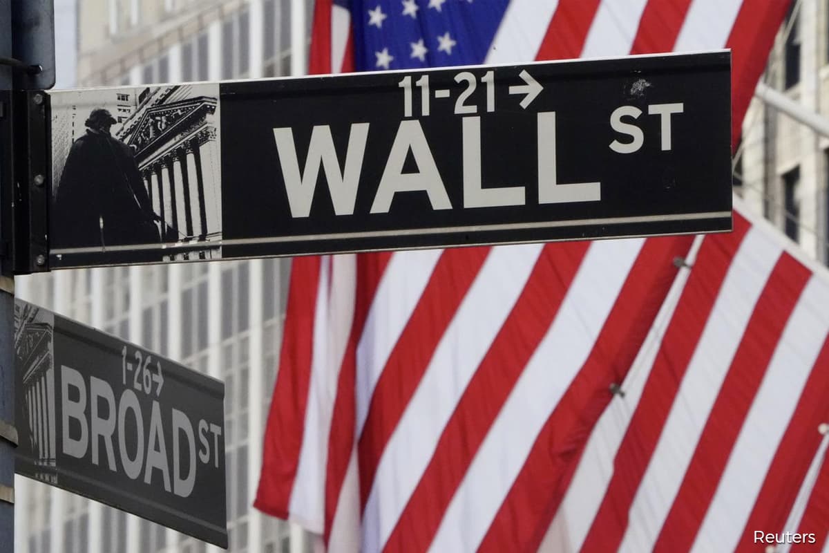 S&P, Nasdaq slip from record levels as earnings season gains speed