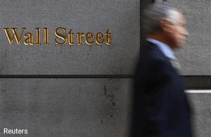 Wall St falls as FBI to review more Clinton emails