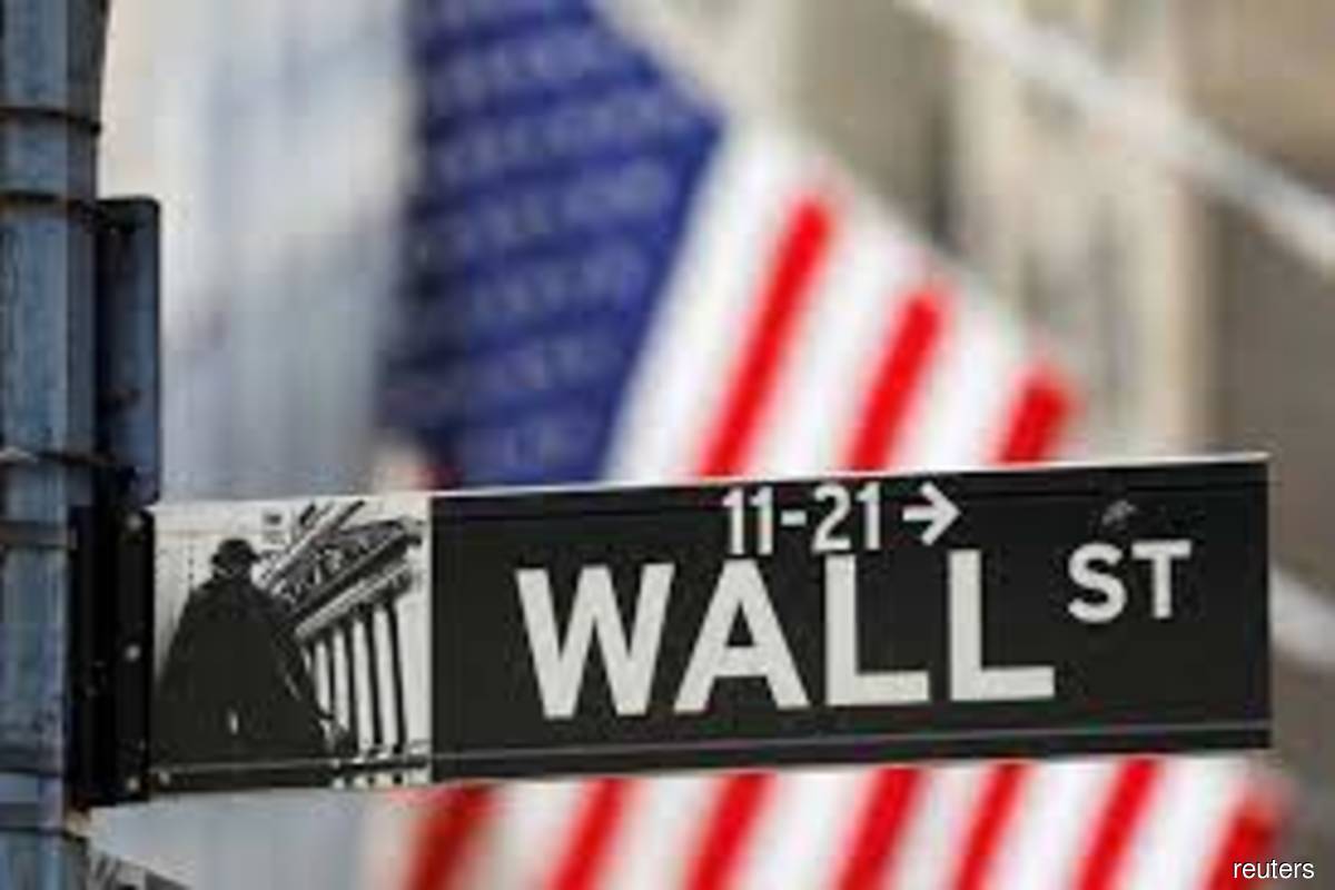 Wall Street slips after Powell's hawkish remarks