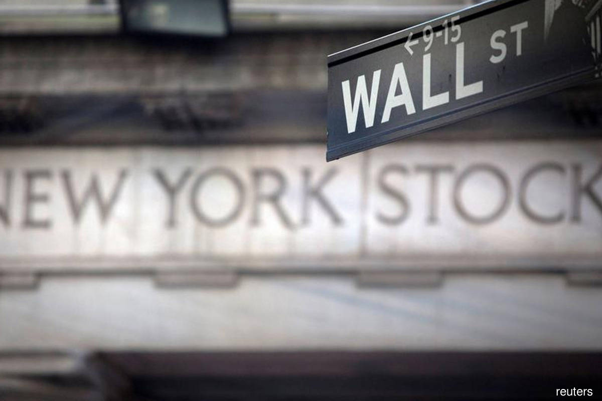 Wall St gains with upbeat earnings and forecasts