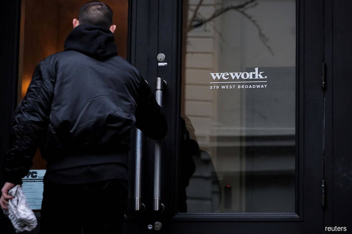 WeWork reaches deals to cut debt, extend maturities