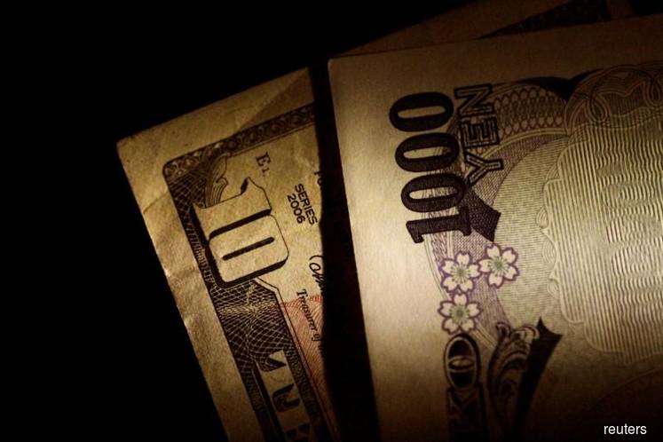 Dollar hits fresh 4-month high vs yen as U.S.-China trade war fears recede