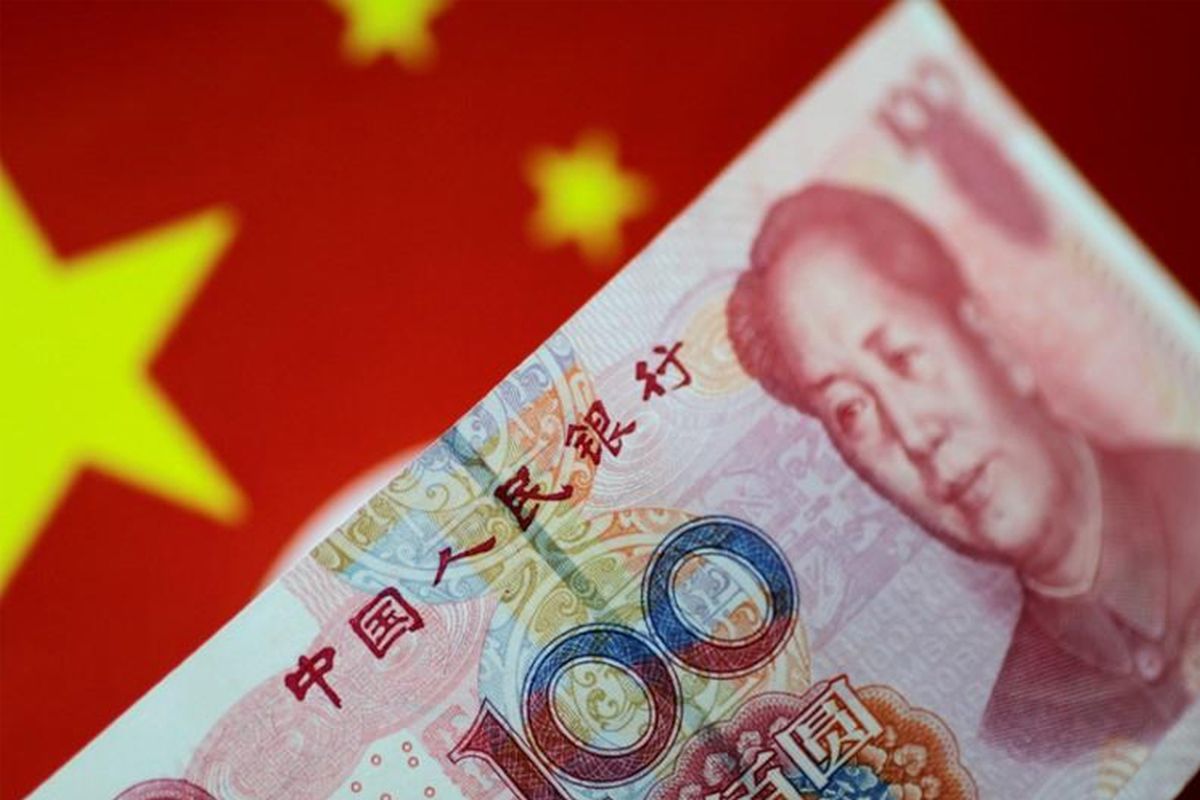 China's offshore yuan slides to two-year low of 7 per dollar