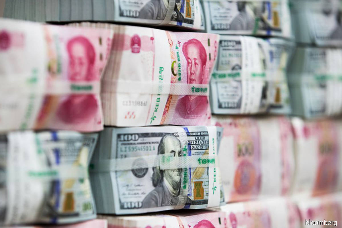 Yuan plunge nears 14-year low, inviting PBOC pushback