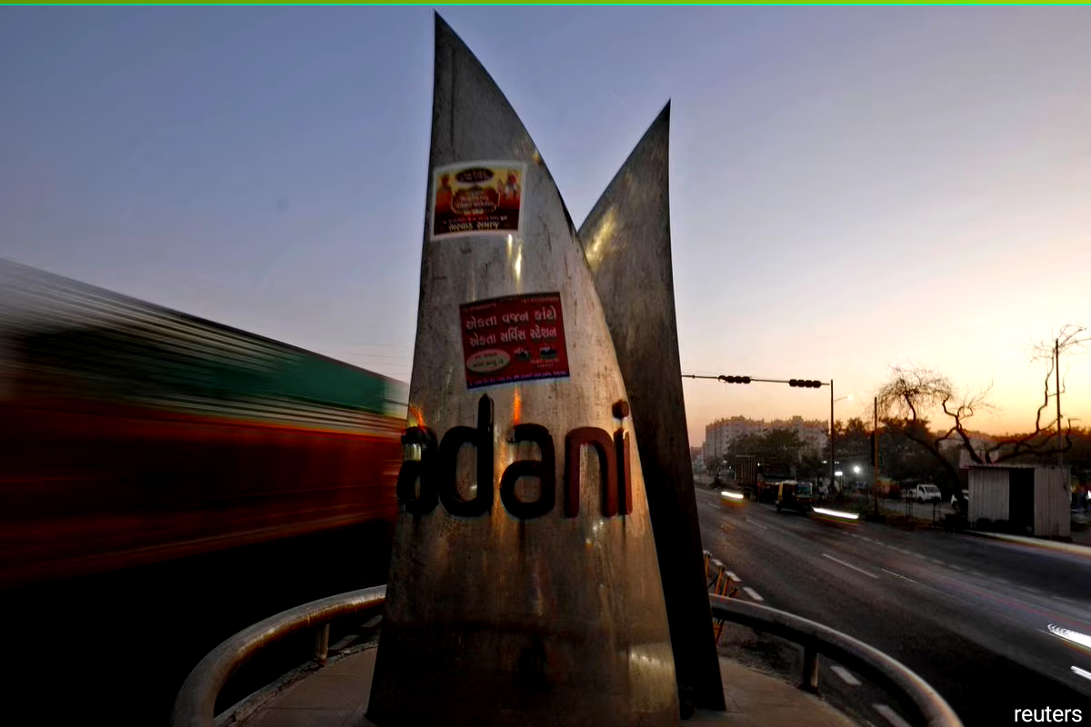 Adani stocks drop on report group seeks more time to repay loans