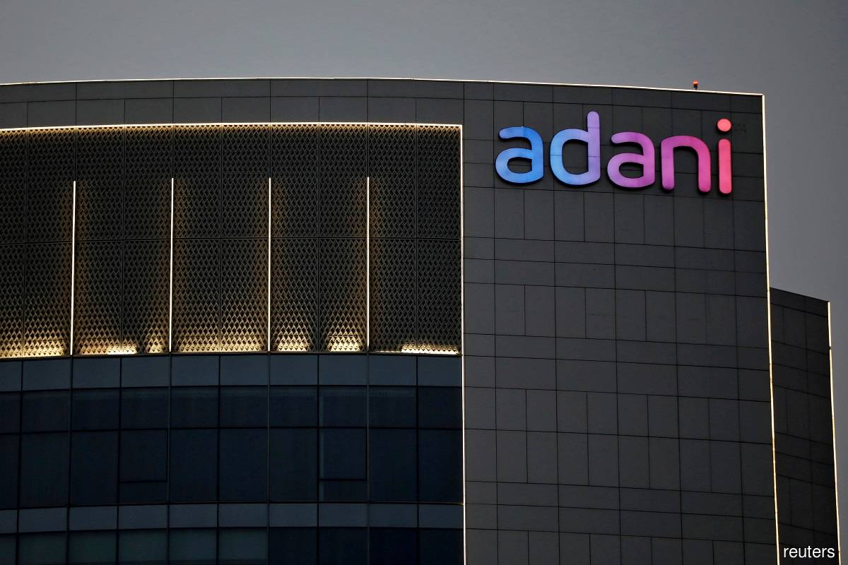 Adani Group debt still a concern but research firm softens tone