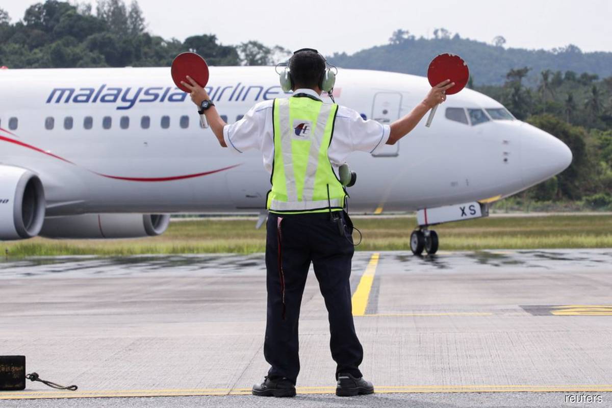 Asia's airlines ramp up flights, offers as tough Covid-19 travel curbs ease