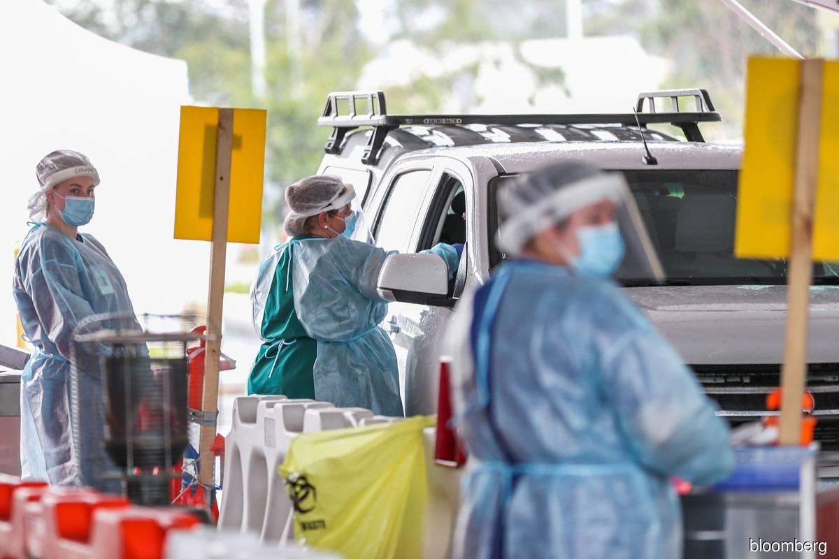 Australia's virus death toll leaps past 400