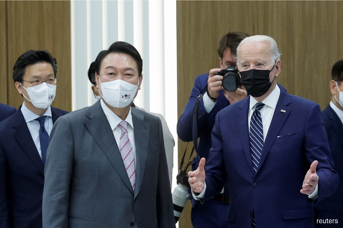 Yoon (left) and US President Joe Biden