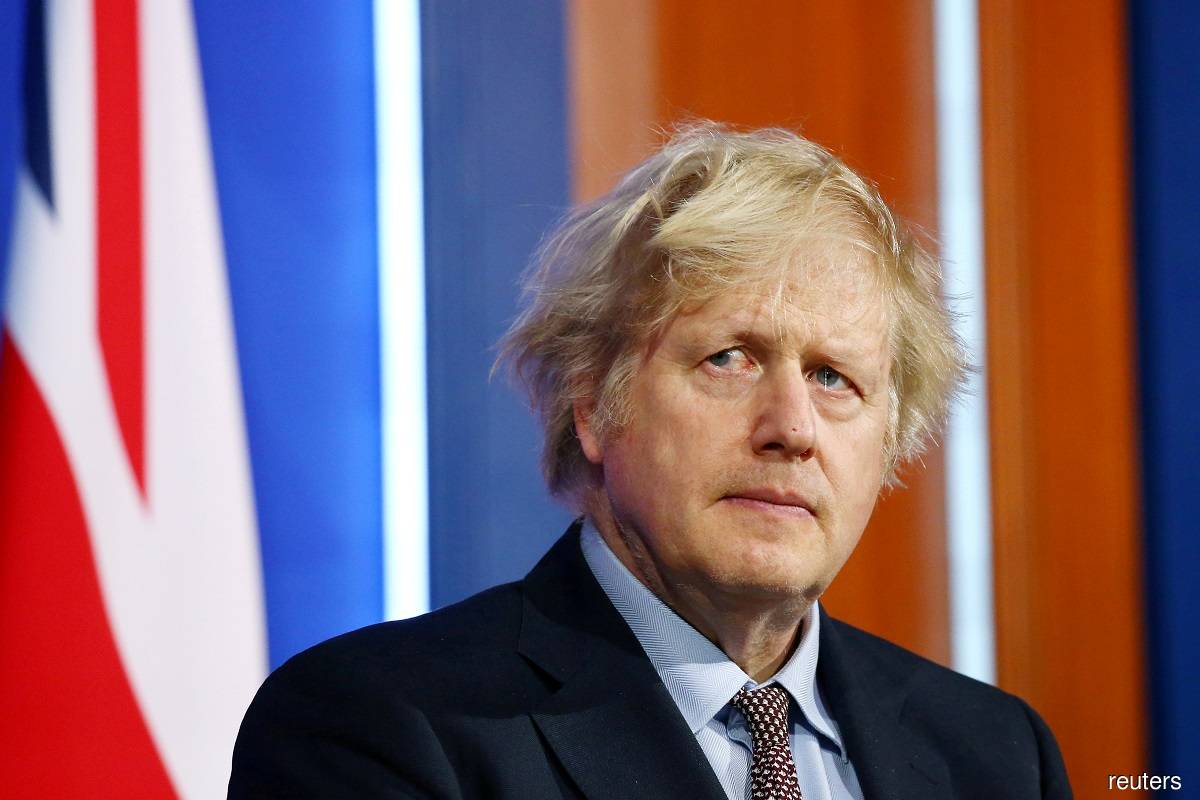 UK PM Johnson visits church where lawmaker was stabbed to death