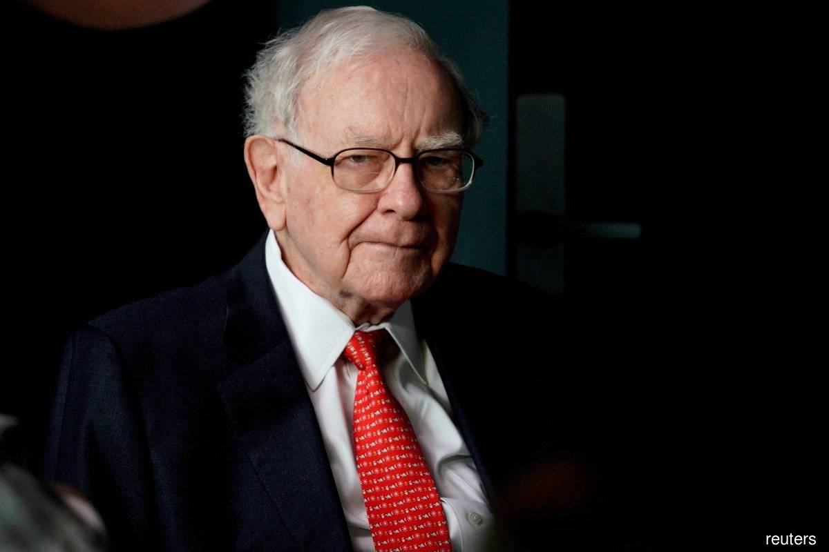 Asked by a shareholder how Berkshire might change over time, Buffett said its building blocks will survive him. (Photo by Reuters)