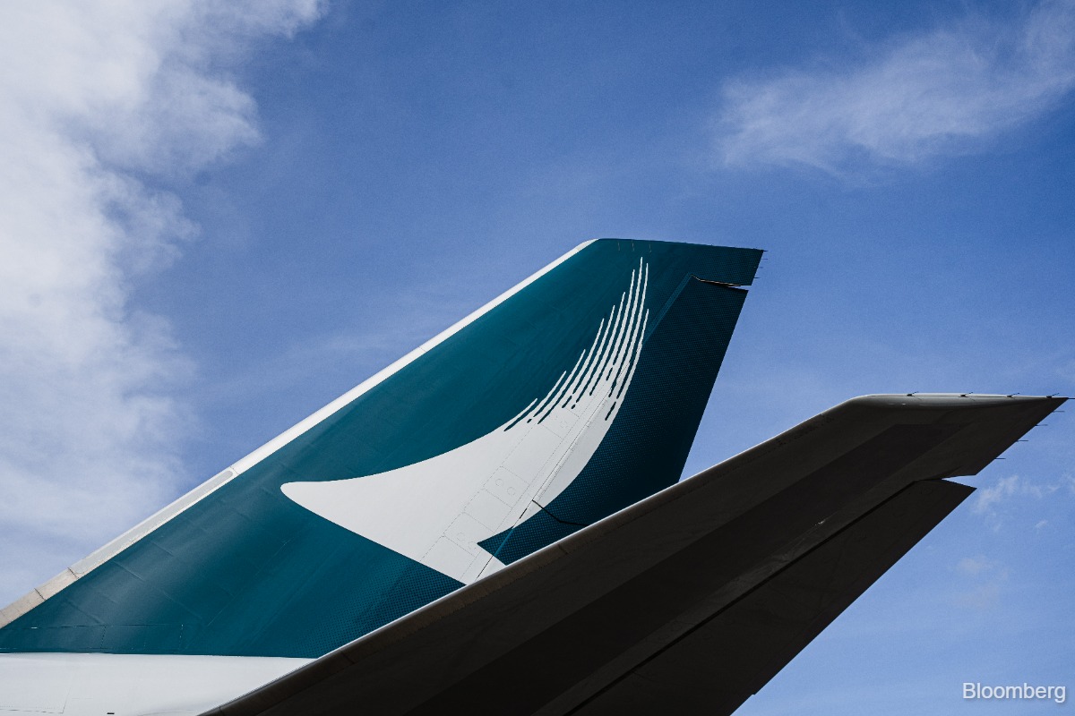 Cathay Pacific以8B美元的价格与波音公司购买14架飞机，第一个十年来