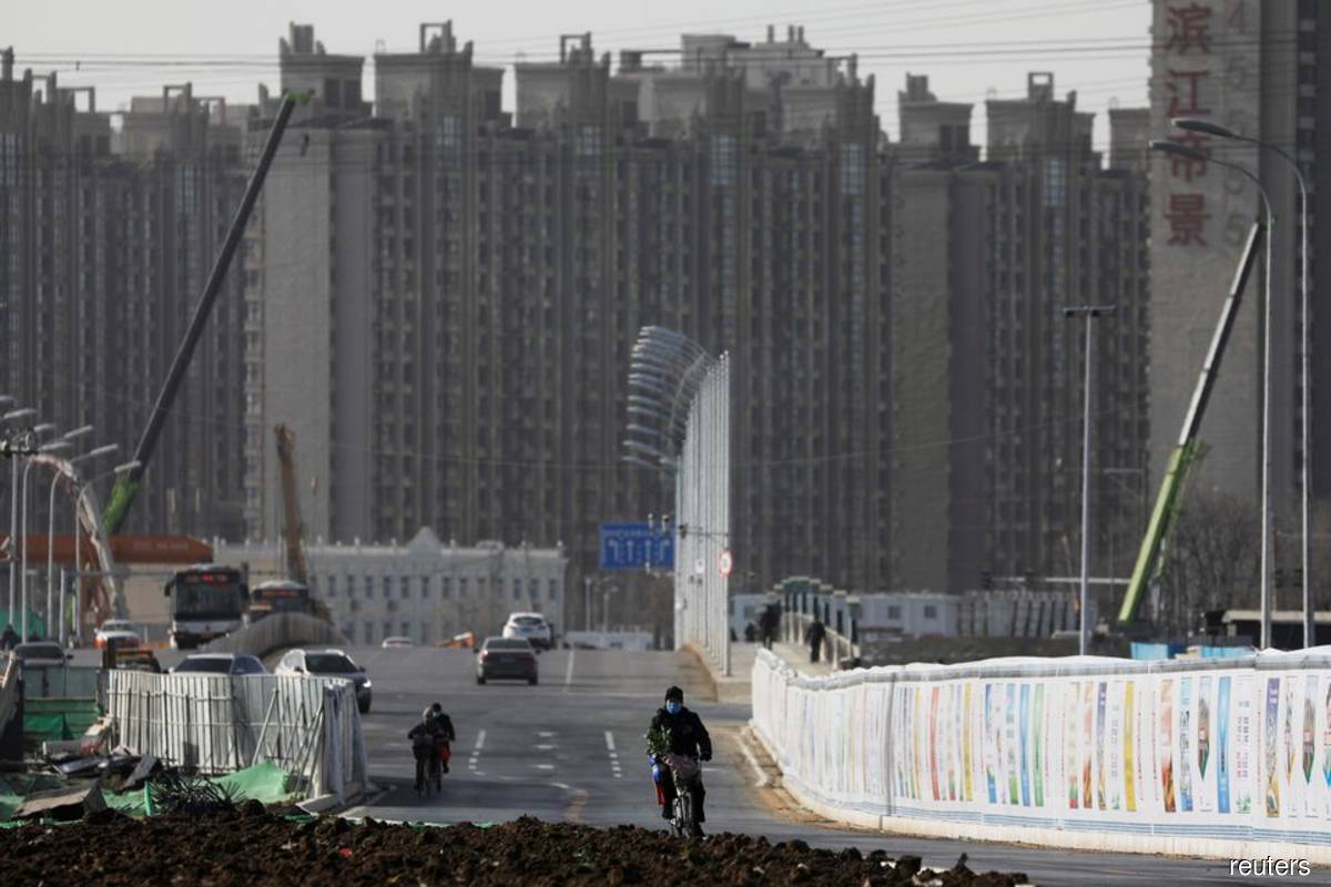 China's new construction starts plunge as chill spreads across sector