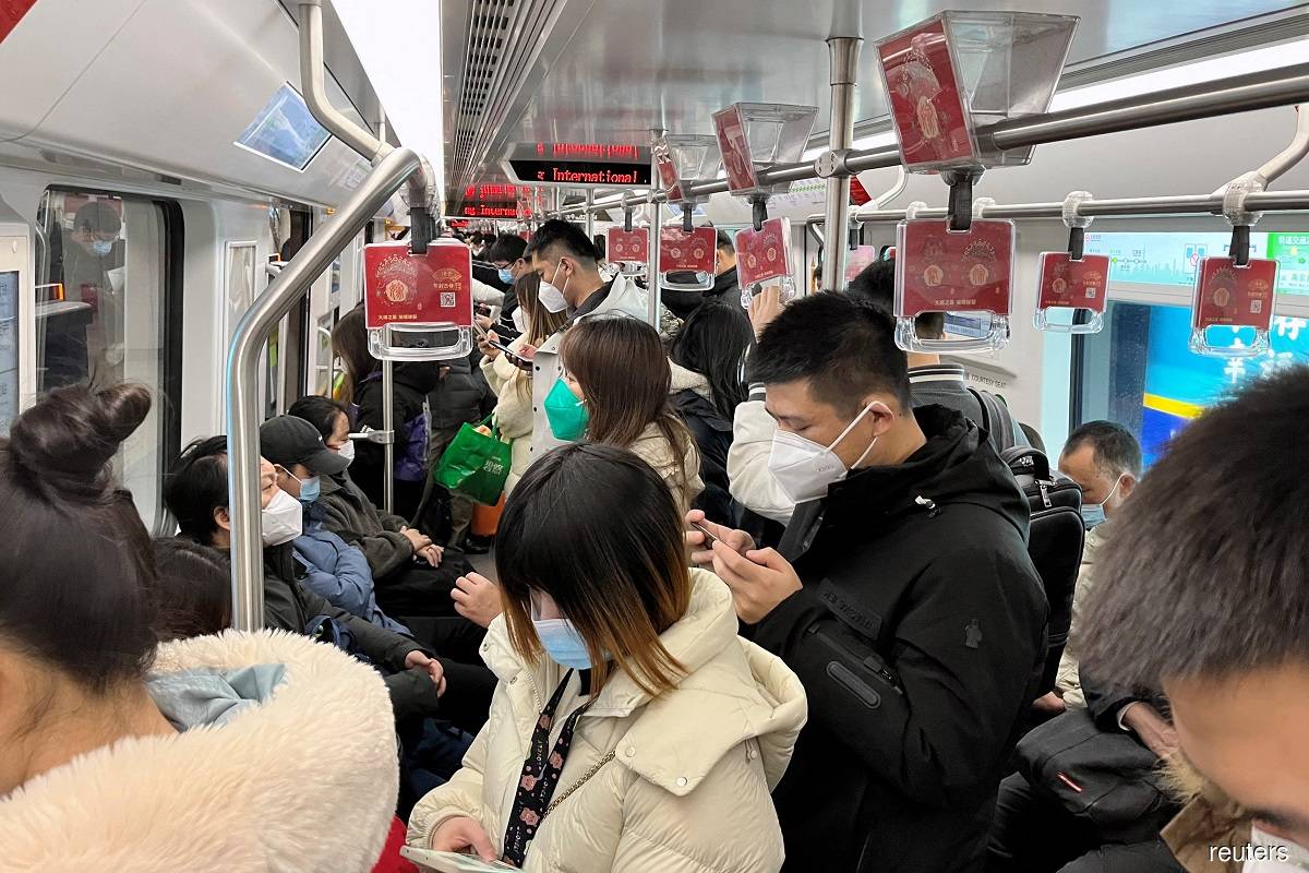 More people ride subway in China’s biggest cities as Covid-19 starts to peak