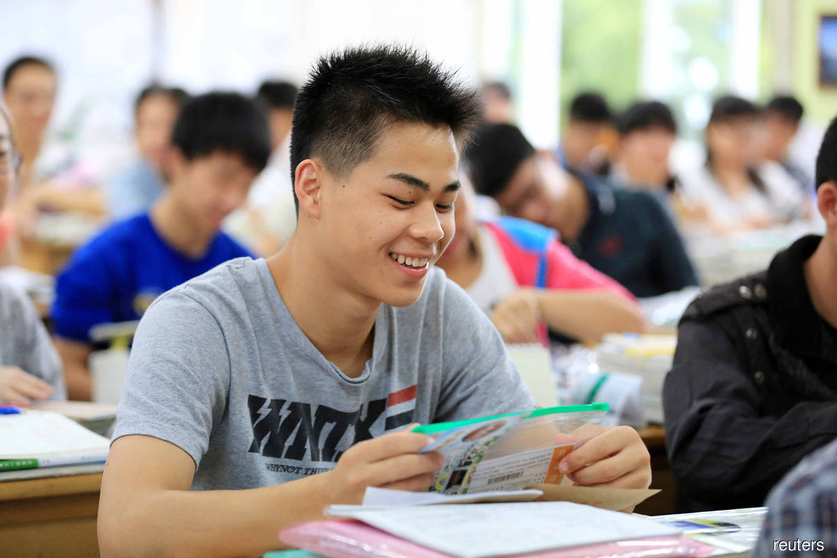 China is urging young Chinese men to be less 'feminine' and more 'manly'. (File photo by Reuters)