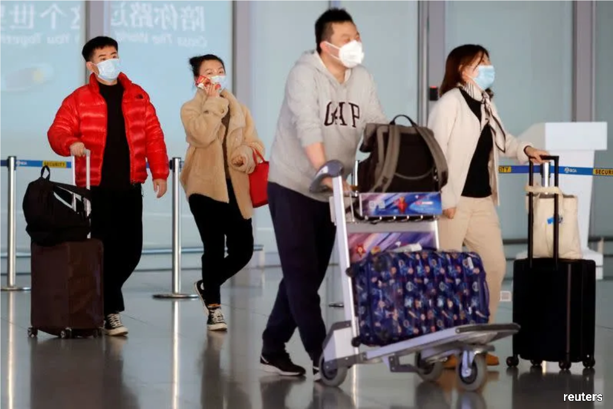 China customs drops some COVID reporting for international arrivals