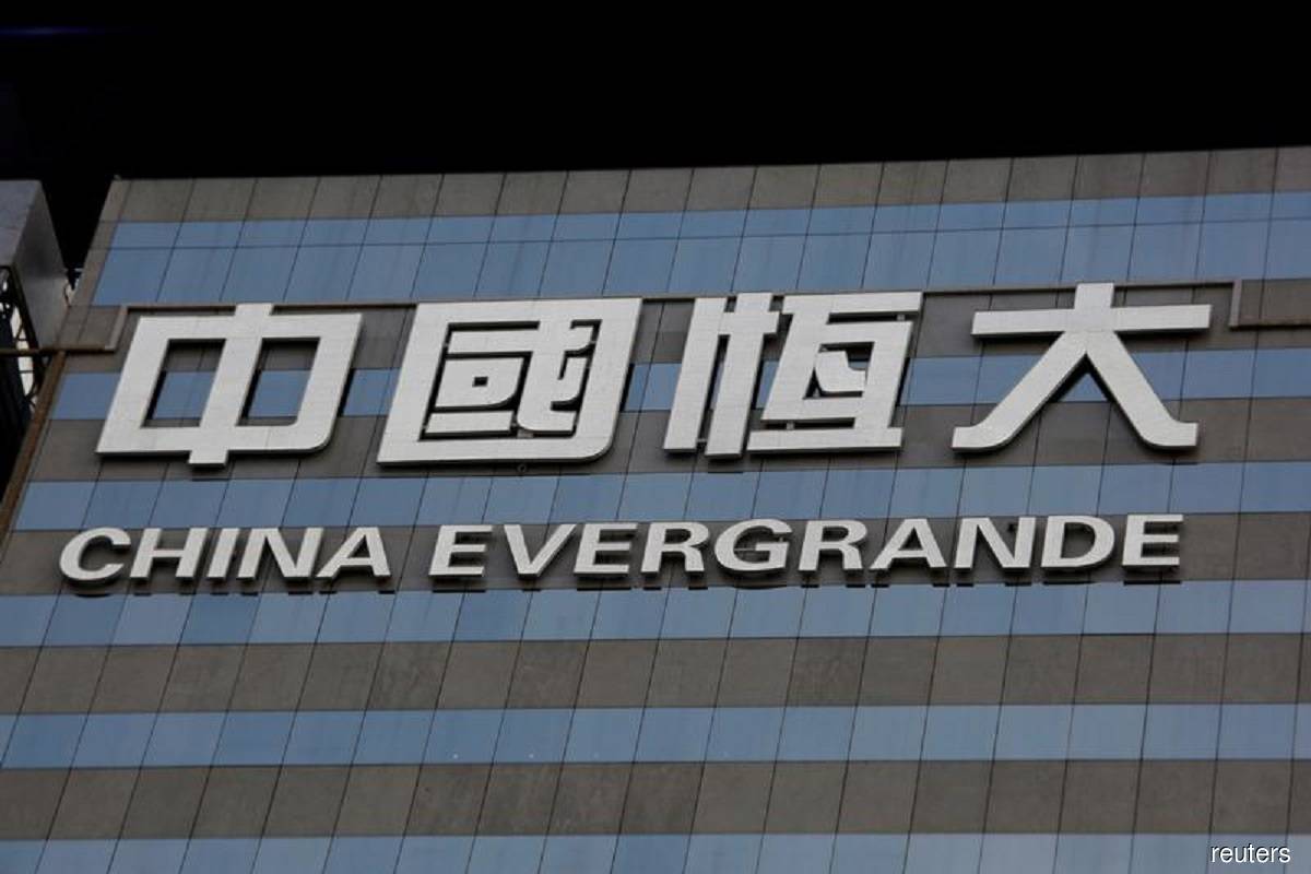 China's indebted Evergrande to sell stakes in internet unit