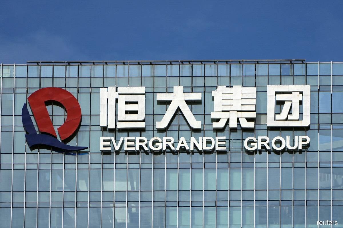 China's debt-ridden Evergrande resumes work on more than 10 property projects