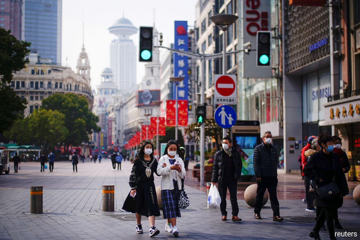 Shanghai cuts tourism, eastern Chinese city limits transport on resurgent Covid