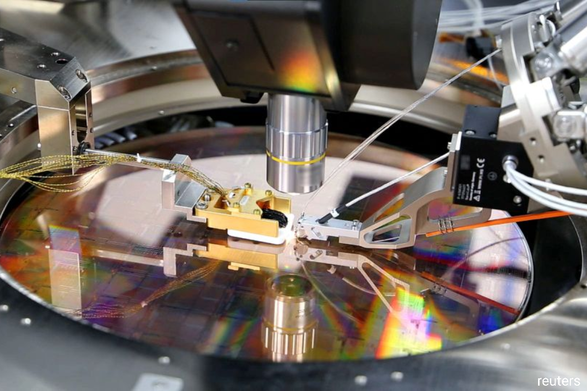 A view of a PsiQuantum Wafer, a silicon wafer containing thousands of quantum devices, including single-photon detectors, manufactured via PsiQuantum's partnership with GlobalFoundries in Palo Alto, California, the US.