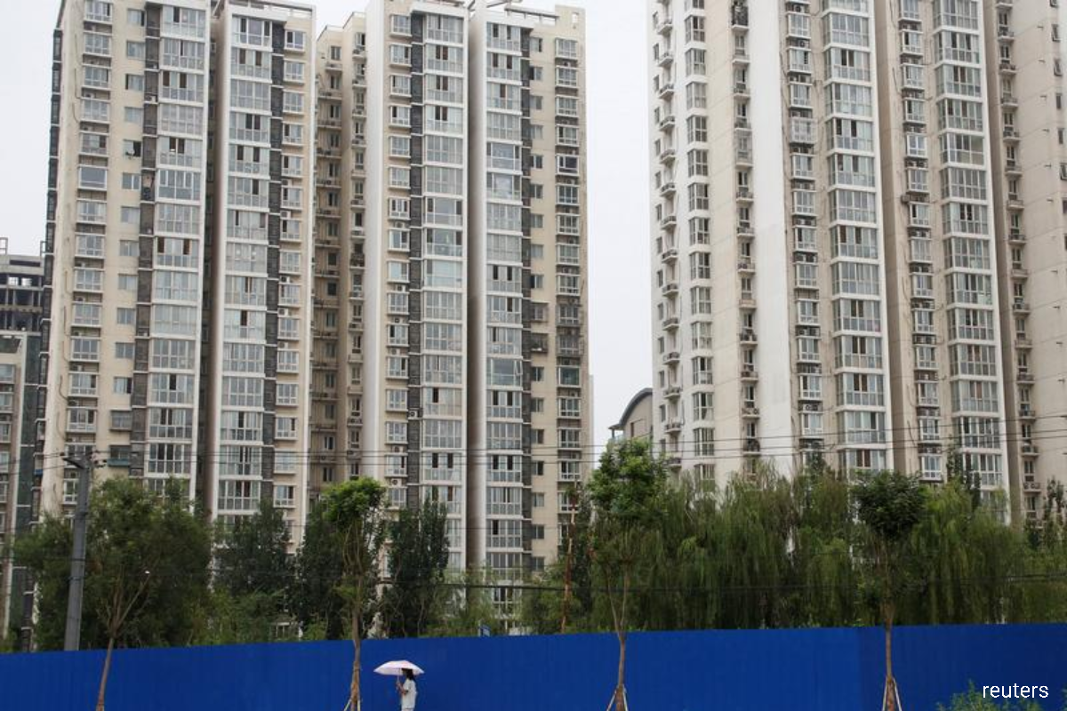China's property market woes expected to worsen in 2022 — Reuters poll