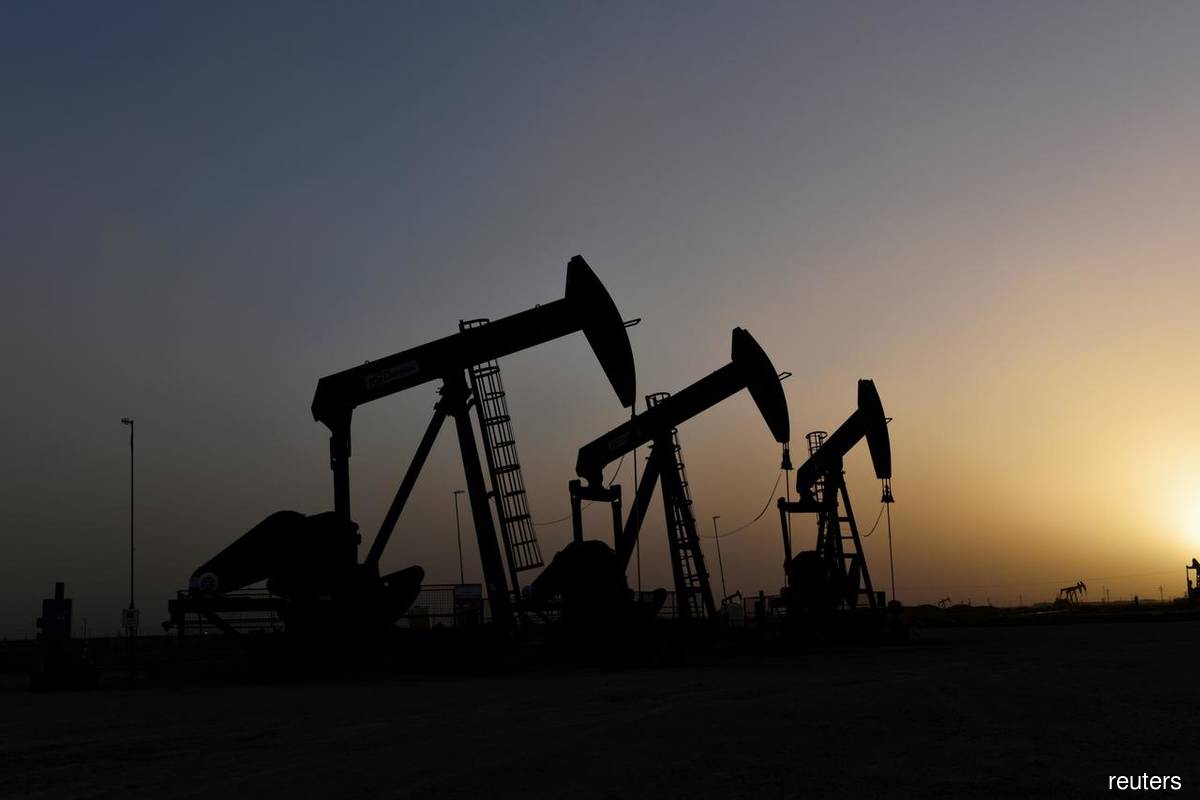Crude oil prices on track for monthly gain as dollar supports