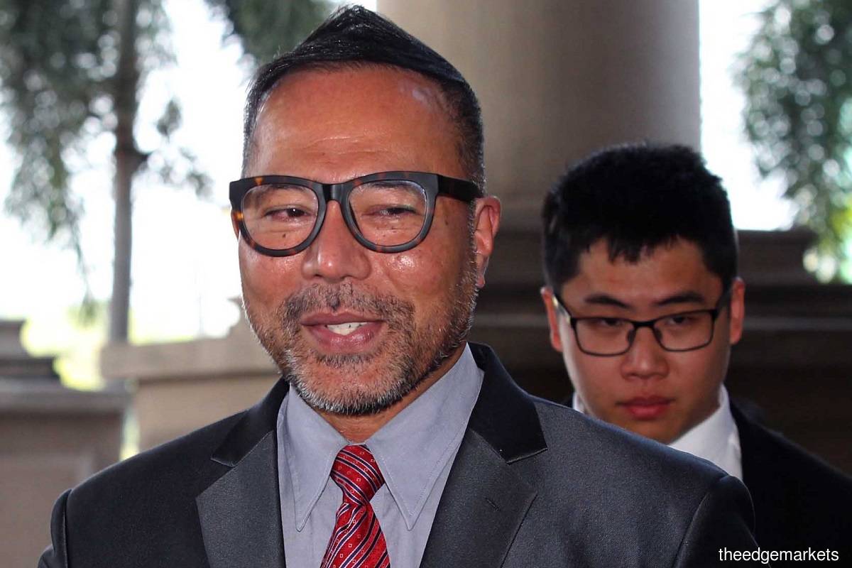 Khairuddin (front) filed the originating summons against Muhyiddin on Jan 18. (Photo by Kenny Yap)