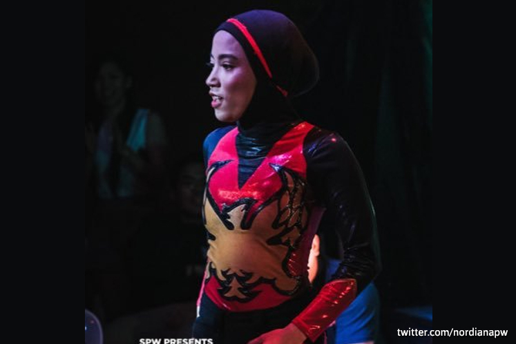 Hijab-wearing Malaysian wrestler named in Forbes' 30 under 30 Asia list