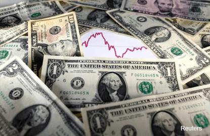 US dollar inches up as investors eye Fed meeting, Dutch elections