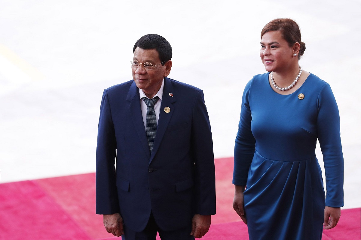 Philippine leader Rodrigo Duterte with his daughter Sara Duterte (Photo by Bloomberg)
