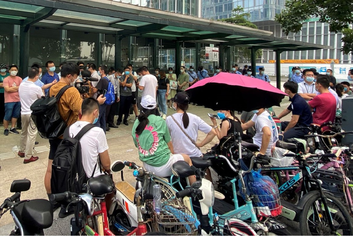 As China Evergrande's debt crisis deepens, unpaid small business owners speak of despair