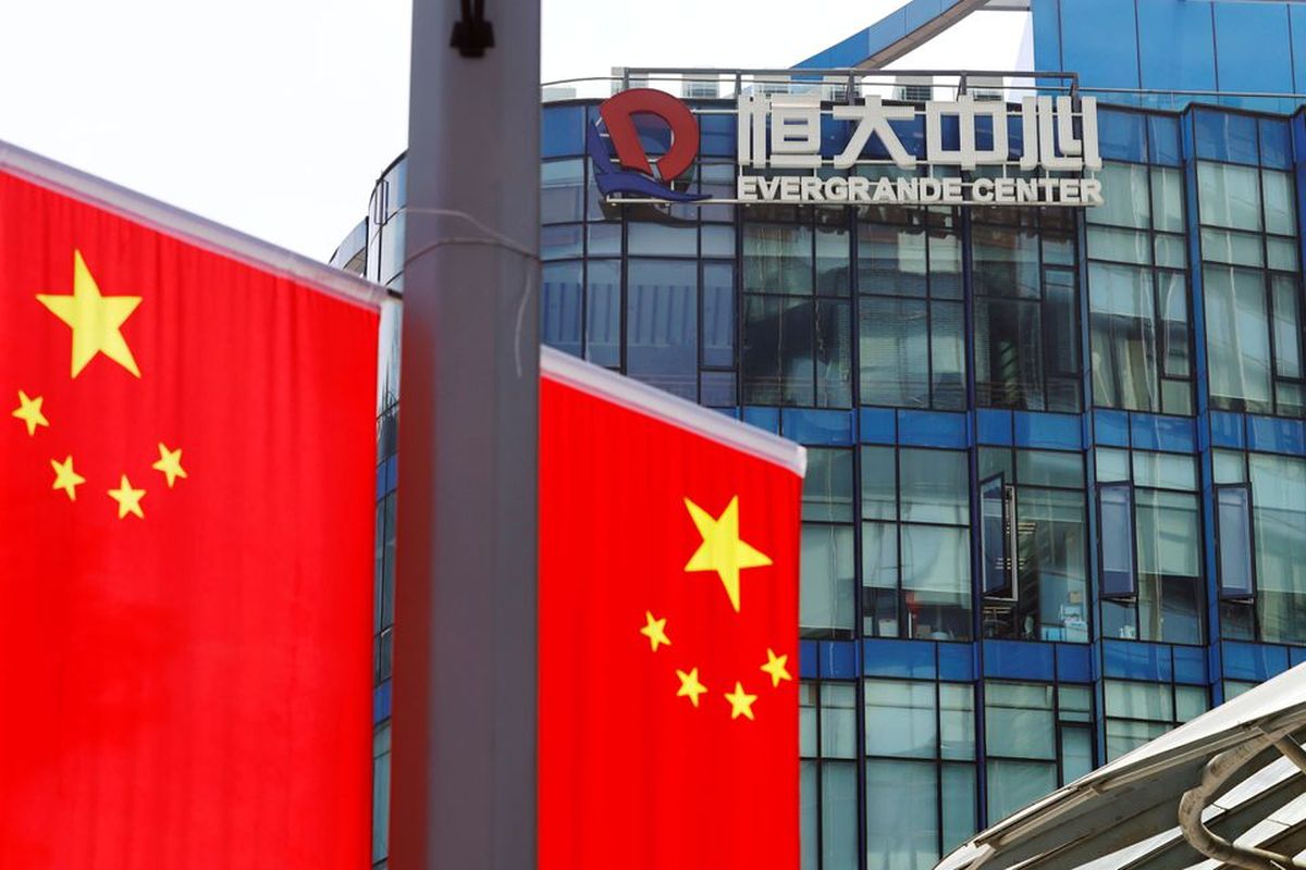 China Evergrande mulls asset transfer to property unit for debt payment