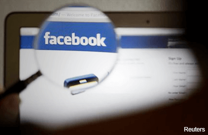 Facebook 'likes' push Wall Street higher