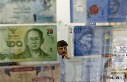 Asian currencies slip on caution ahead of Trump-Xi meeting