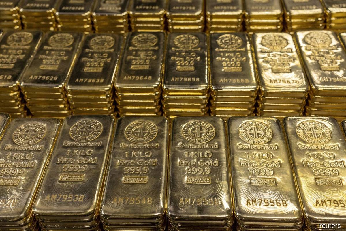 Gold eases off one-week high as US dollar regains some ground