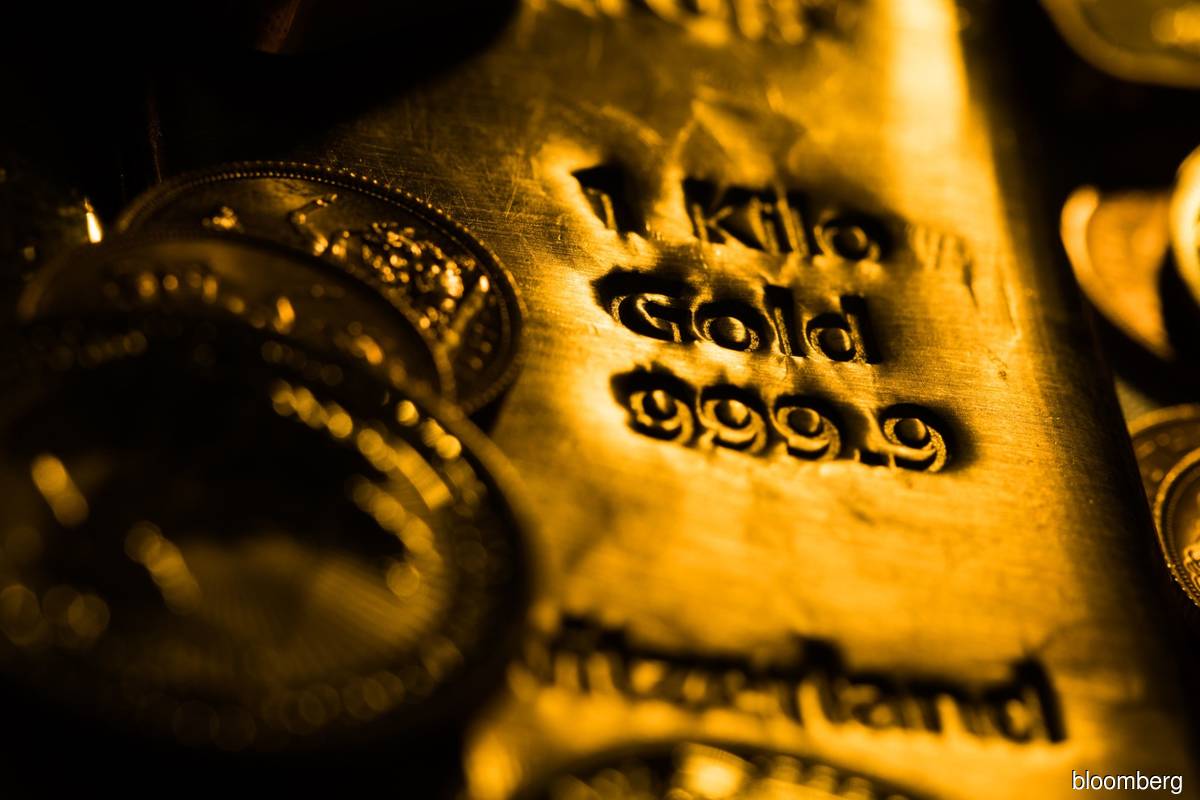 Gold rises as rally in US dollar Treasury yields hits brakes
