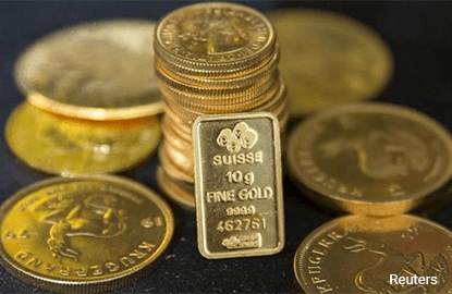 Gold steady, seen staying near lows with eyes on U.S. rates