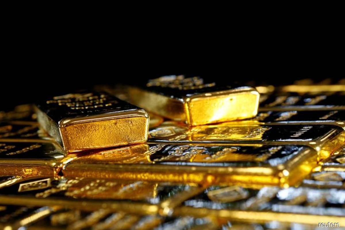 Gold up, but headed for worst month in seven on US rate hike bets