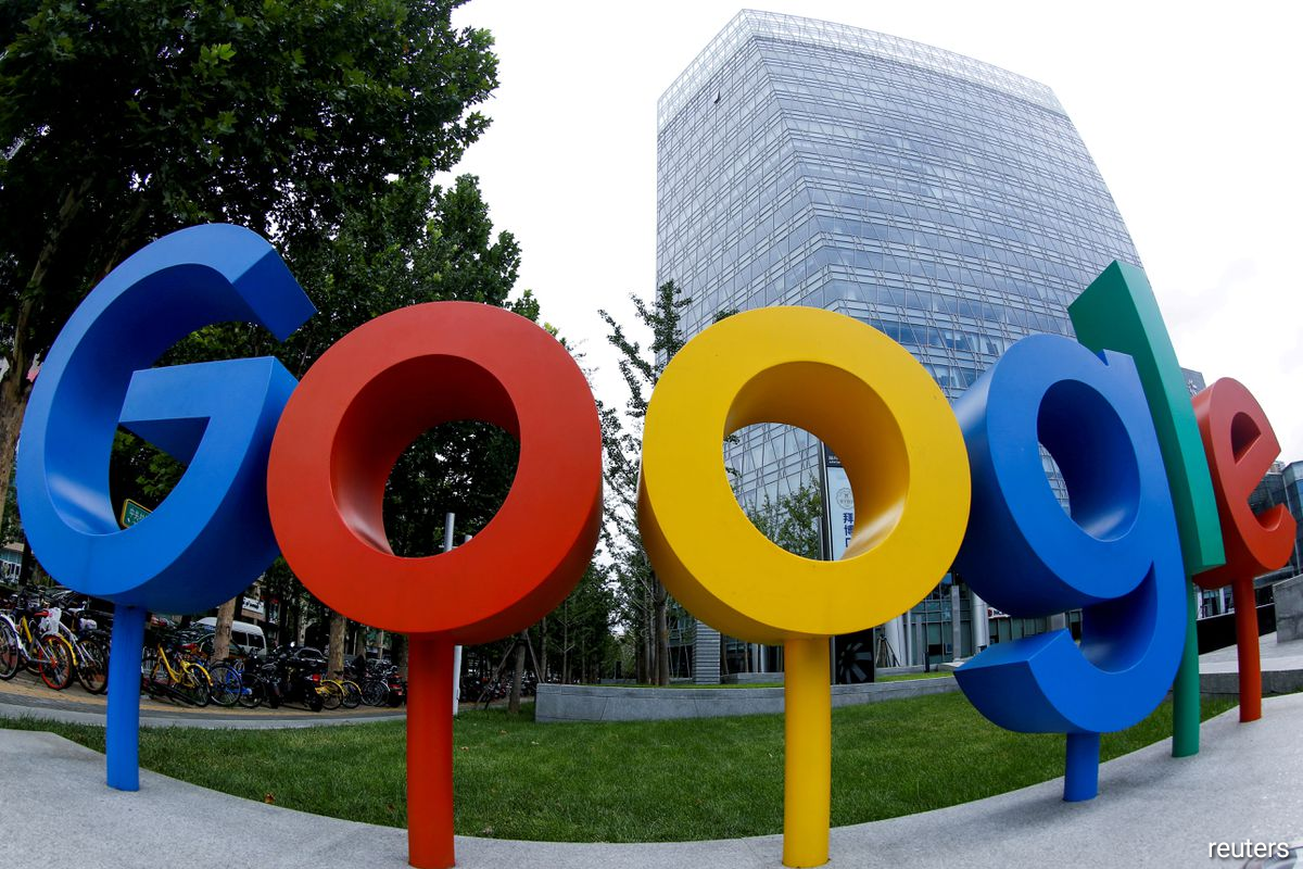 Alphabet earns record profit on Google ad surge