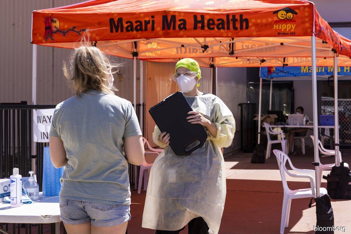 Australia introduces home testing as Victoria cases surge