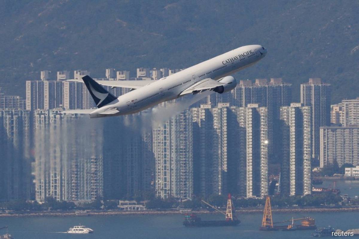 Hong Kong suspends flight bans as it eases Covid-19 rules
