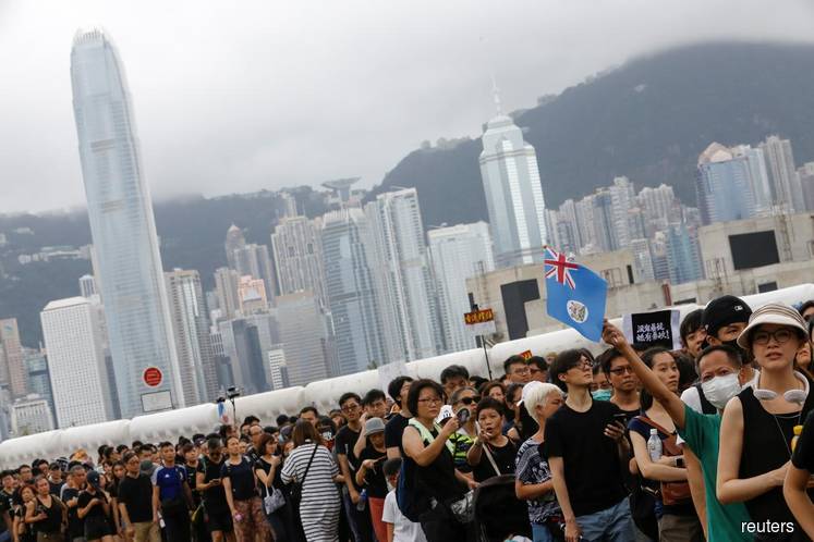 HK pro-democracy activist to run for local office