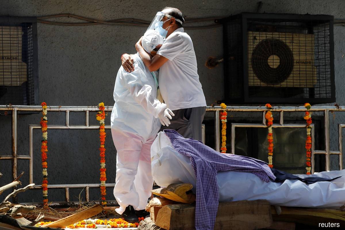 Bureaucratic barriers leave Covid-19 patients begging for beds in India's most populous state